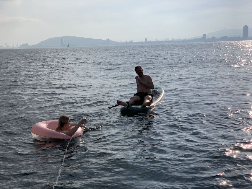 Barcelona: 2-Hour Sailboat Tour with Paddle Boarding - The swimming and paddle boarding stop is where the fun lands