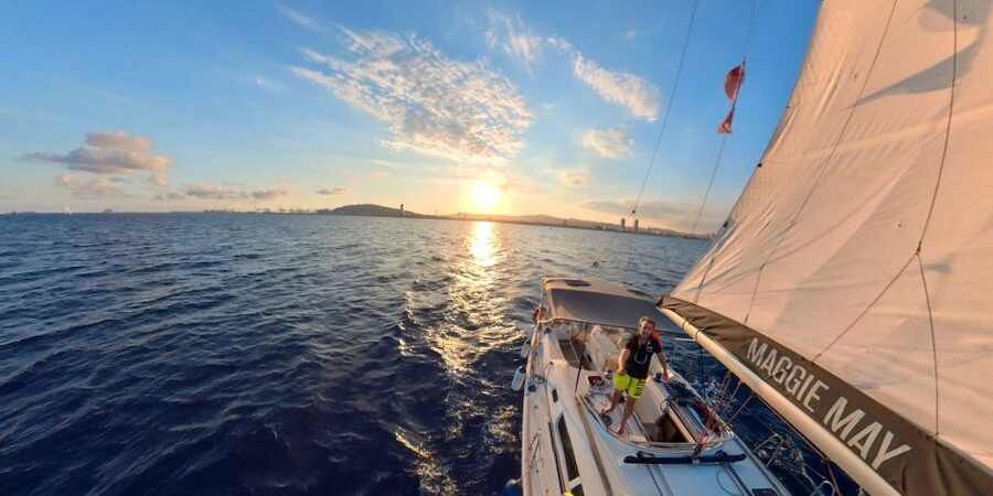 Barcelona: 2-Hour Sailboat Tour with Paddle Boarding - Onboard vibe: sailing basics, music, and a real aperitif