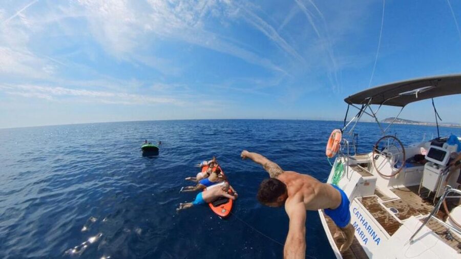 Barcelona: 2-Hour Sunset Sailboat Trip - Swimming, paddle board time, and the best part of Barcelona in your swim suit
