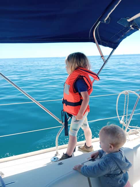 Barcelona Badalona : Sailboat Tour, Snacks, Drinks, Swimming - Skyline Observation With Binoculars: Small Tool, Big Payoff