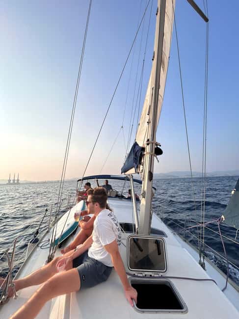Barcelona Badalona : Sailboat Tour, Snacks, Drinks, Swimming - Paddleboard (SUP) Time: Fun for Beginners, Escape for Everyone Else