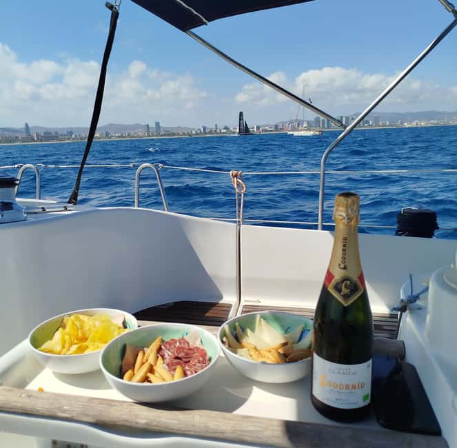 Barcelona Badalona : Sailboat Tour, Snacks, Drinks, Swimming - Badalona to the Coast: What the 2 Hours Usually Feel Like