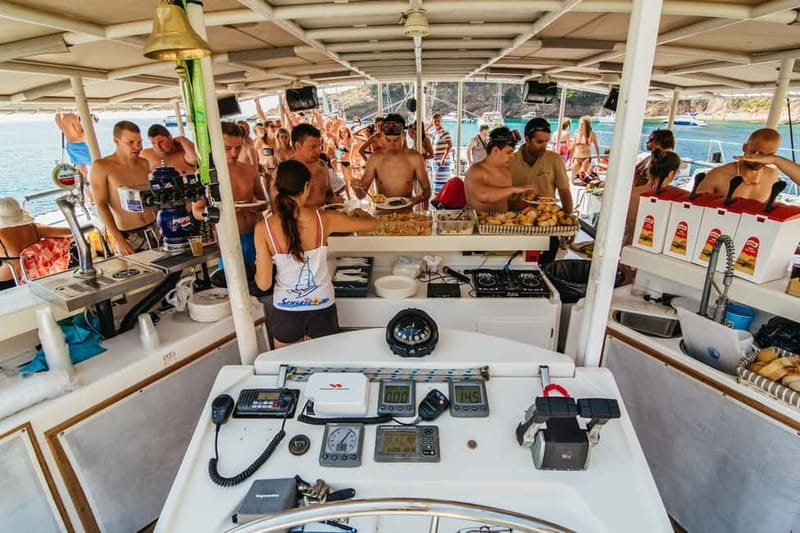 Barcelona: Catamaran Party Cruise with BBQ Meal - BBQ, Donut, and Included Drinks: What You Actually Get On Board