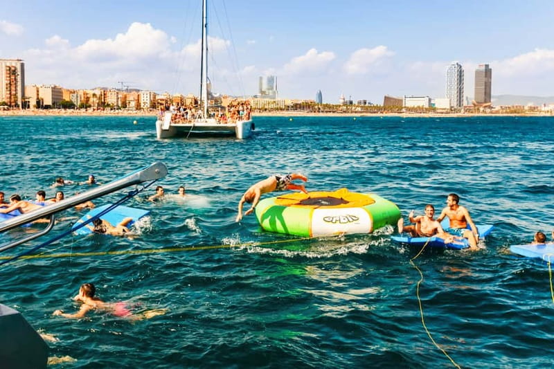Barcelona: Catamaran Party Cruise with BBQ Meal - Timing Matters: 11:00, 14:30, 18:00, and 18:30 TARDEO