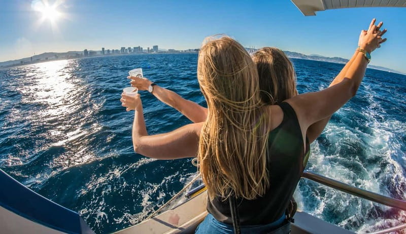 Barcelona: Charcuterie, Swim & Party Boat - DJ Music, Magician Moments, and Deck-Fun Comfort
