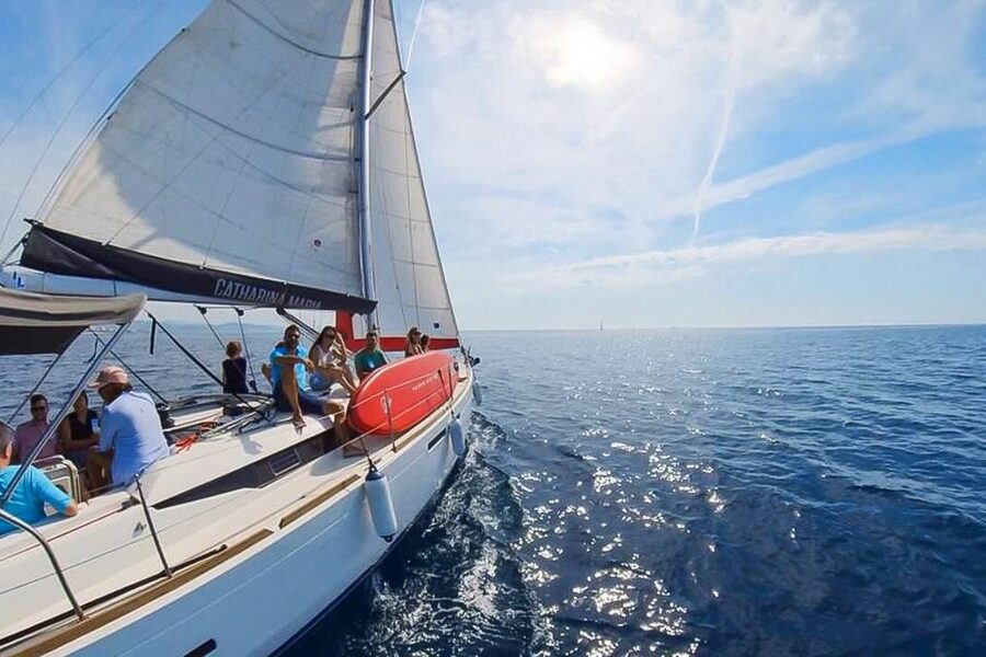 Barcelona: Coastline Boat Trip with Snacks and Cava - Barcelona coast from the water, in a tight 2 hours