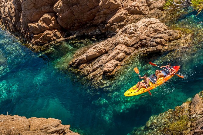 Barcelona Costa Brava Kayak, Snorkel & Cliff Jump Day Tour - Kayaking along dramatic coastline and into sea cave country