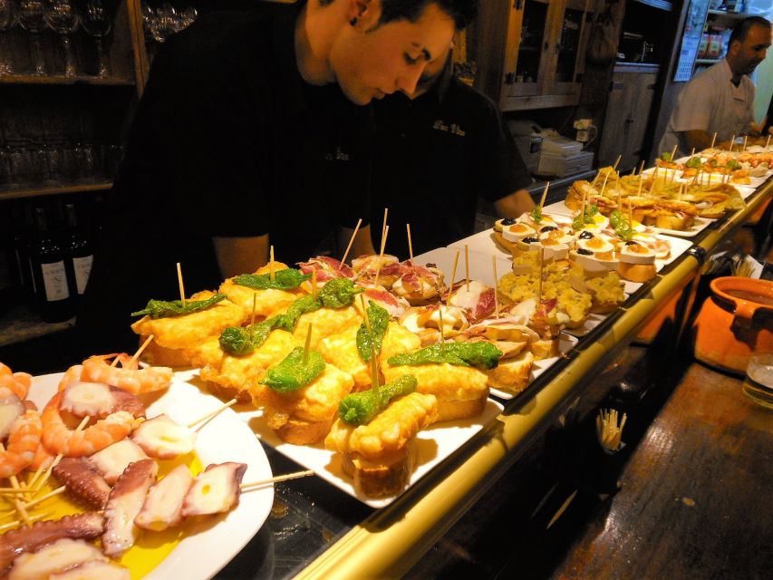 Barcelona: Evening Walking Tour in the Gaudi Area with Tapas - Four Tastings Plus a Night Walk Through Gaudi Territory