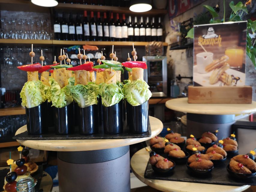 Barcelona: Food & Drink Tasting Tour in Traditional Taverns - OToxo 3 Germans, tapas and charcuterie with a locals-first feel