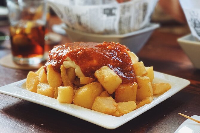 Barcelona Food Tour: Tapas, Drinks and Delights with a Local - Stop 4 at Plaça de Sant Josep Oriol: pintxos, markets, and art energy