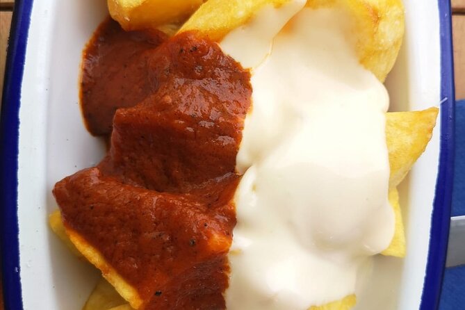 Barcelona Food Tour: Tapas, Drinks and Delights with a Local - Stop 1 in Barri Gòtic: vermuteo, classic bites, and iconic sights