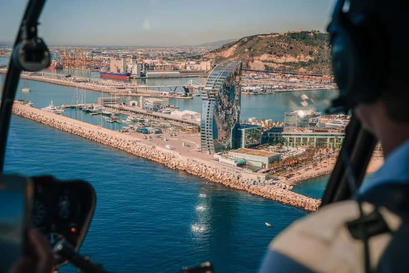 Barcelona: Helicopter Flight, Boat Ride, and Walking Tour - The black cab transfers and the Port Vell setup for sea views