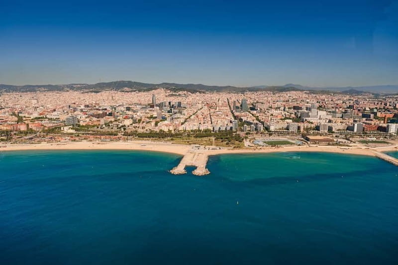 Barcelona: Helicopter Flight over Barcelona's Coastline - Olympic Port, Agbar Tower, and the city’s skyline cues from above