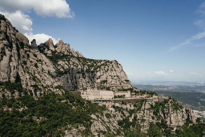 Barcelona: Montserrat and Winery Tour with Tapas or Lunch - Santa Maria de Montserrat Abbey: A Guided Walk That Adds Meaning