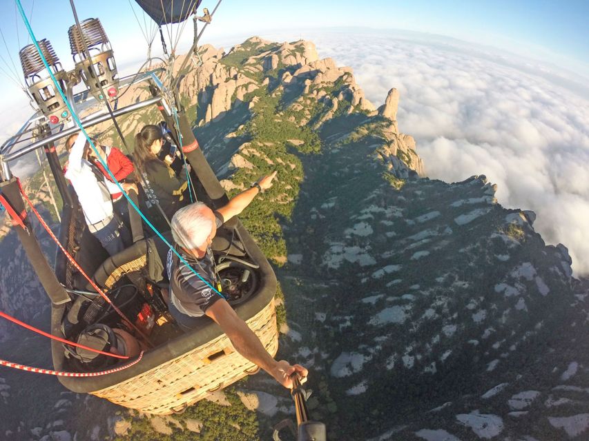 Barcelona: Montserrat Hot-Air Balloon & Monastery Experience - The inflation moment, then about 1 hour flying close to Montserrat