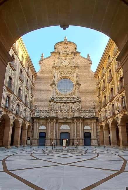 Barcelona: Montserrat Monastery and Natural Park Guided Tour - Back at the monastery: free time, plus a quick food market stop