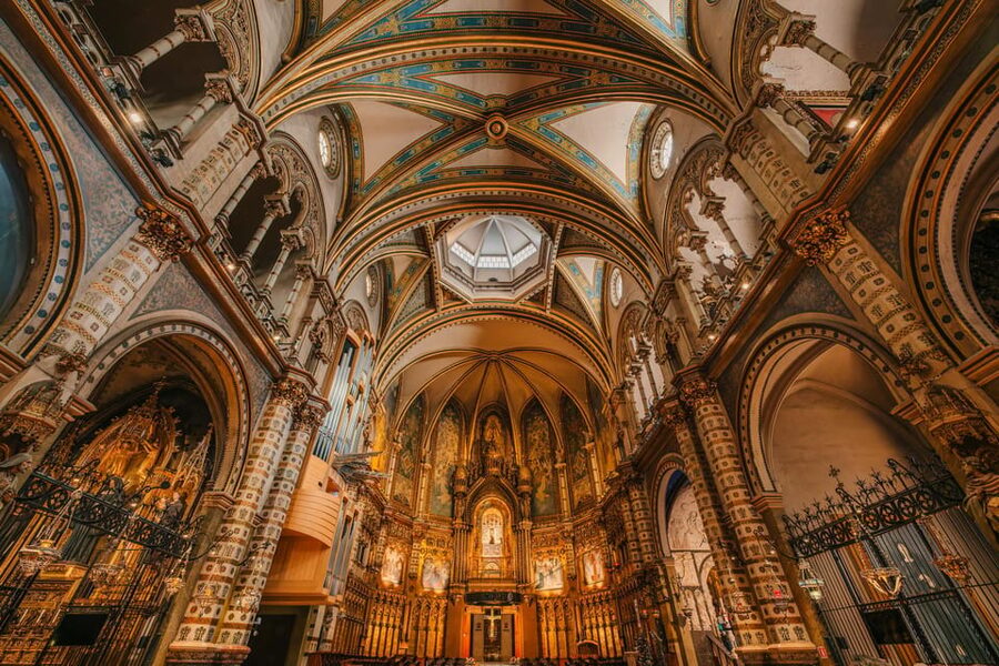 Barcelona: Montserrat Visit & Lunch at Farmhouse Small Group - Inside Montserrat Abbey: 10th-Century Roots and La Moreneta