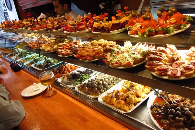 Barcelona Old Town Night Small Group Tour with Tapas & Flamenco - Meet at Hard Rock Café, Then Walk into the Old Town Core