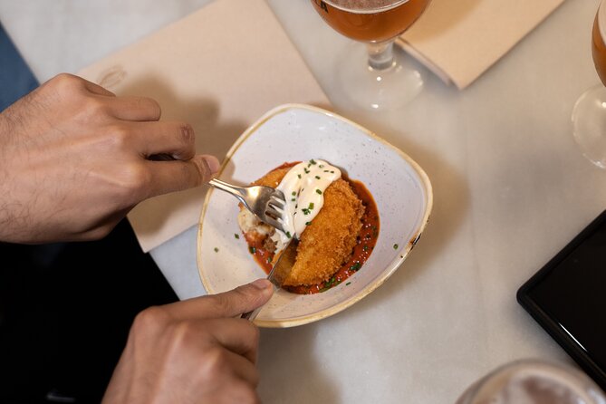Barcelona Old Town Tapas Tour: Vermouth, Bites & Hidden Gems - Placa Sant Felip Neri and Pont del Bisbe: quiet squares and photo legends