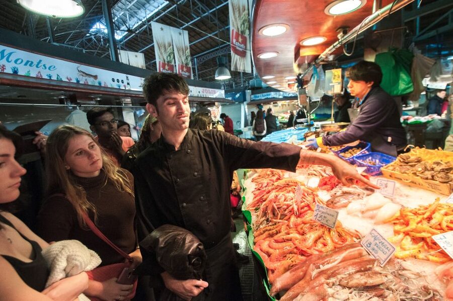 Barcelona: Paella Cooking Experience & Boqueria Market Tour - Sangria Mixing at the Bar: Unlimited Drinks, Medieval Roots