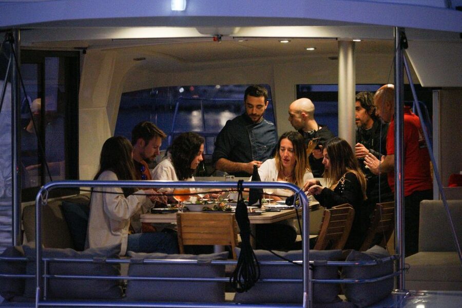 Barcelona: Private Catamaran Sailing with Drinks and Snacks - Barcelona skyline photo moments, including golden light