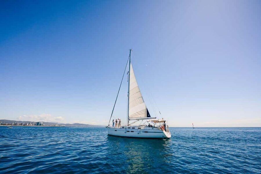 Barcelona: PRIVATE Sailing tour with drinks and snacks - The Barcelona skyline from the sea, plus an optional swim