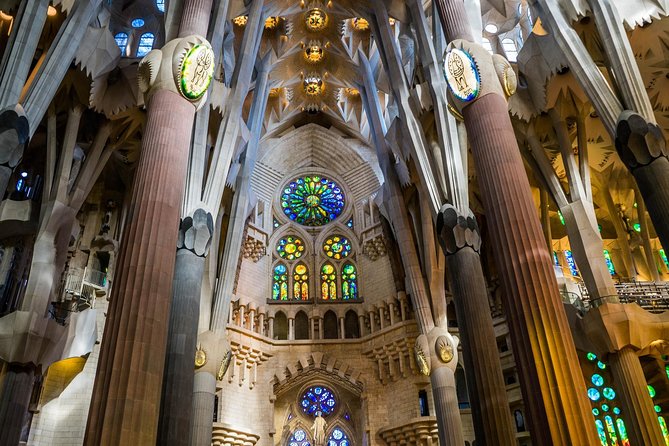 Barcelona: Sagrada Familia Fast Track Tour with Tower Option - Inside Sagrada Familia: stained glass and design you can actually interpret