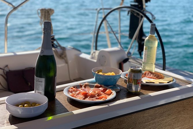 Barcelona Sunset Cruise with Light Snacks and Open Bar - Sailing into the open sea at sunset: skyline views you cannot replicate on foot