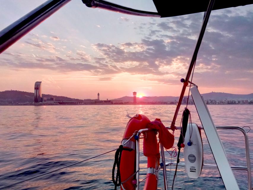 Barcelona: Sunset Sailing Tour with Open Bar & Snacks - The Marina Port Vell Stop: Stretch Your Legs, Then Back to Views