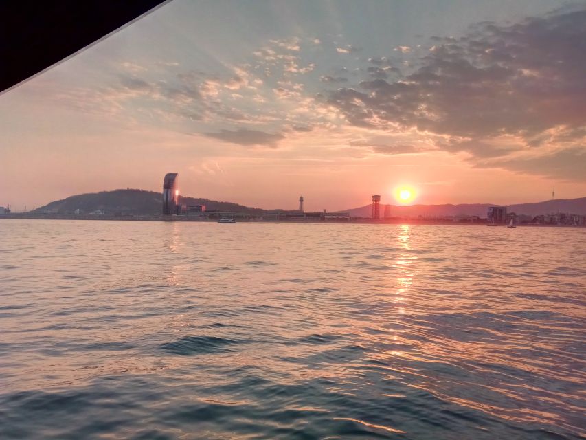 Barcelona: Sunset Sailing Tour with Open Bar & Snacks - The First 10 Minutes: Safety, Cold Drinks, and Getting Oriented