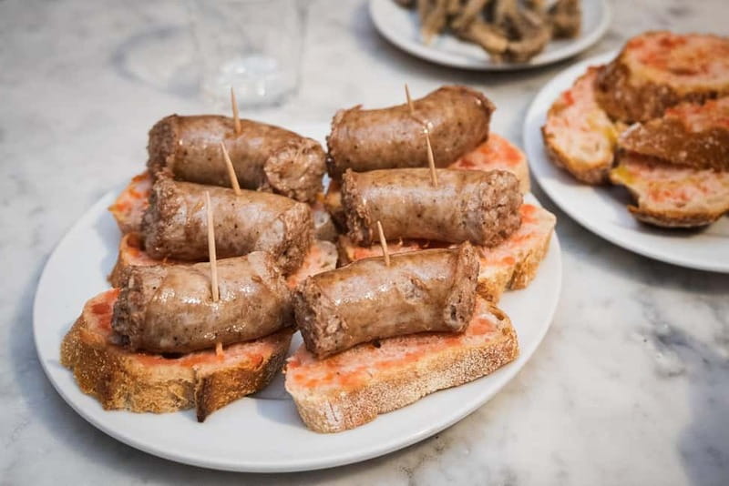 Barcelona: The Ultimate Local Tapas & Drinks Food Tour - Finding the Start Line: Plaça de l’Angel and Jaume I