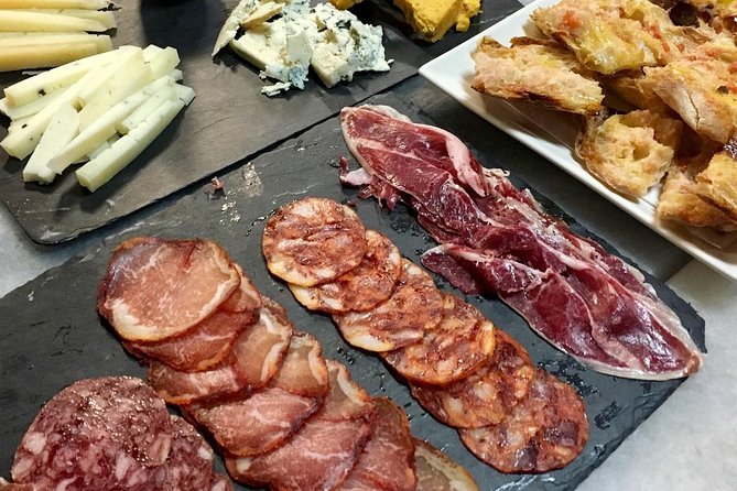 Barcelona Wine and Gourmet Tapas Tour - Eixample architecture plus the final tasting burst