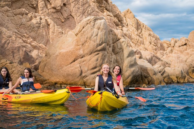 Costa Brava Kayak & Snorkel Tour + Picnic from Barcelona - Getting in the water: safety brief, life jackets, and tandem kayaking