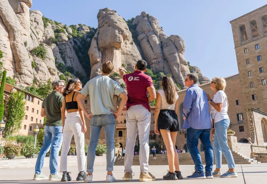 From Barcelona: Half-Day Montserrat Experience - The 45-minute guided tour: basilica, farmer market, and getting the story fast