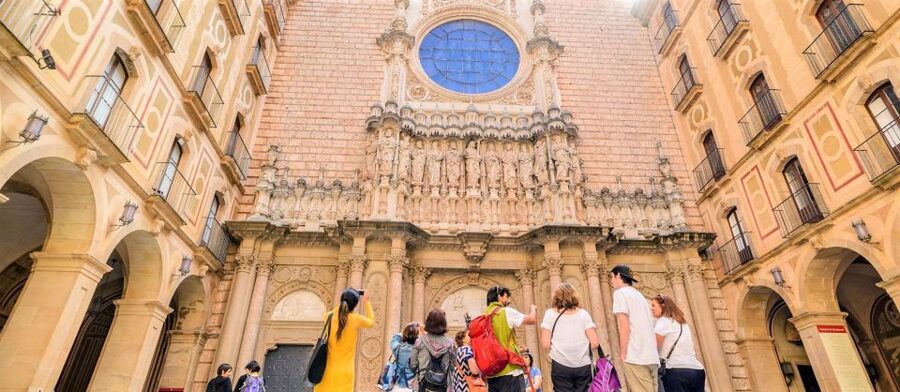 From Barcelona: Montserrat Monastery & Scenic Mountain Hike - Getting There: Passeig de Gràcia, the 8:00 Departure, and the Van Ride