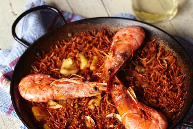 Interactive Paella & Market: Bottomless Wine & Rambla Views - Who Should Book This Class In Barcelona