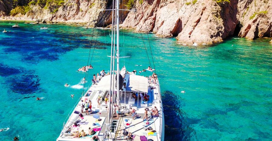 Lloret de Mar: Catamaran Sailing Cruise with BBQ and Drinks - The Costa Brava Sail Out: Cliffs, Caves, and Fishing Villages