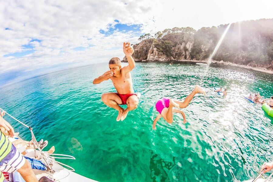 Lloret de Mar: Catamaran Sailing Cruise with BBQ and Drinks - Choosing the Right Departure: Morning for Families, Afternoon for Adults