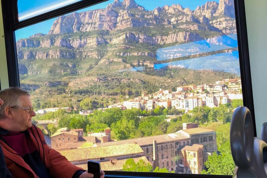 Montserrat Small Group Tour with Train and Cable Car - The train ride out of Barcelona, and where your seat can help