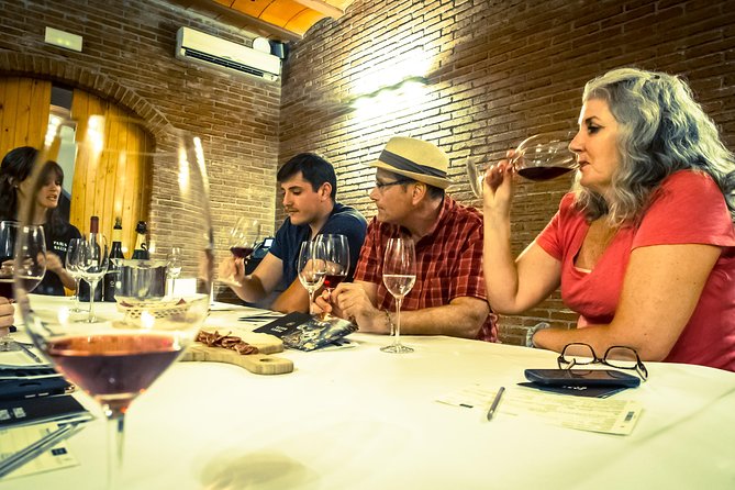 Montserrat & Winery Visit Tour with Traditional Farmhouse Lunch - Family winery visit in Penedes: cellars, Cava context, and tasting