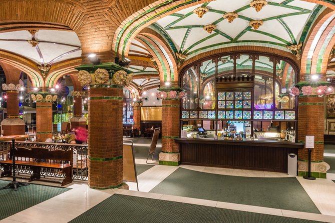 Palau de la Musica Catalana Guided Tour - The Concert Hall finale: stained glass arches and the inverted-dome skylight