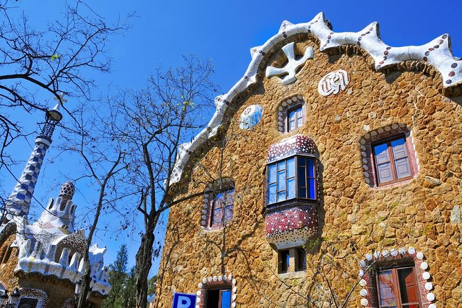 Park Guell Guided Tour with Skip the Line Tickets - The Wave-Shaped Iron Gate and Former Casa Larrard Gardens