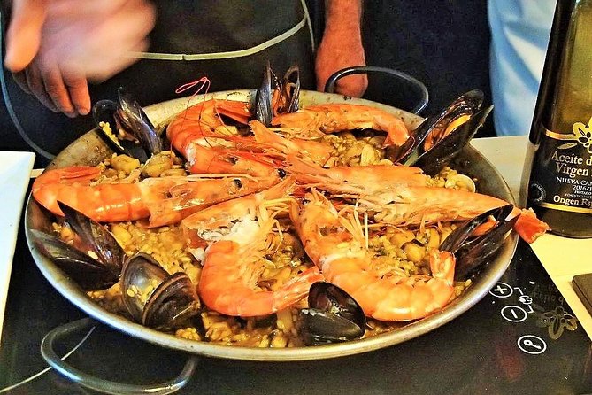 Premium Paella Cooking Class & 10 Spanish Tapas - The meal starts before you cook: 10 tapas and wine pacing