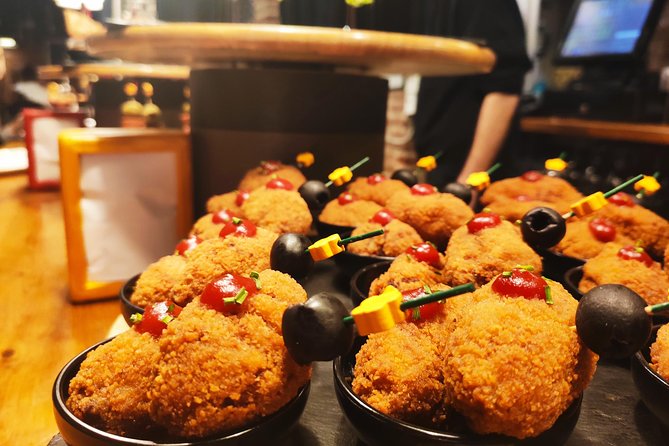 Spanish Wine and Tapas Tour in a Local Neighborhood in Barcelona - El Poble Sec bar hop: four stops, different tapas, different wine