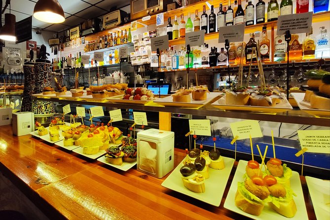 Spanish Wine and Tapas Tour in a Local Neighborhood in Barcelona - Vegan and vegetarian tapas: no pre-set menu, real flexibility